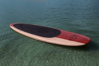 three brothers boards wood paddle boards 70-30 on the water