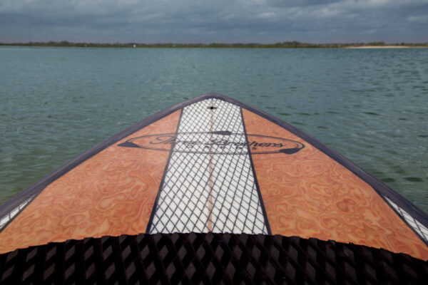 three brothers boards wood paddle boards rico heading to the beach
