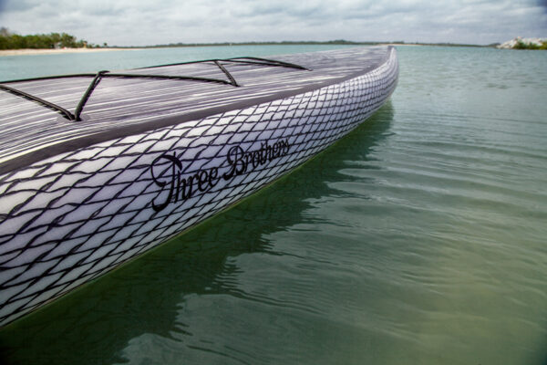 three brothers boards wood paddle boards jimbo side detail on the water