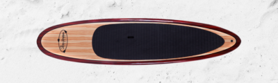 three brothers boards wood paddle boards red tail on the sand